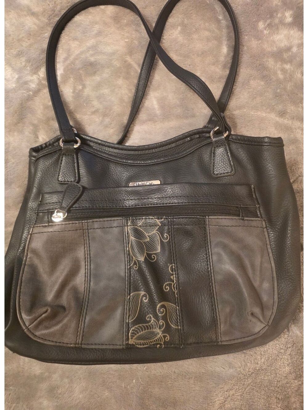 The Sak Black Leather Shoulder Bag with Floral Accent